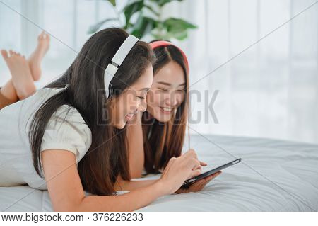 Asian Lesbian Love Couple Daily Lifestyle. Indoor Activity Together At Home. Pride And The Lgbt Comm
