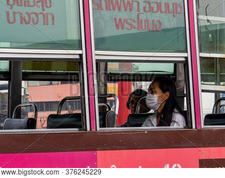 Bangkok, Thailand - January 16, 2020: Woman Wearing Protecting Mask On A Bus In The Old Town.
