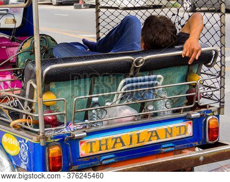 Bangkok, Thailand - January 16, 2020: Tuc Tuc Driver Resting In The Old Town.