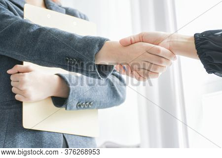 Business People Shaking Hands, Women Shaking Hands. Recruitment Concept, Business Success Background