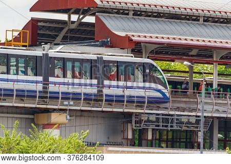 Moscow, Russia - May 12, 2019: View Of Train Of Moscow Monorail Against Telecentre Station In Sunny 