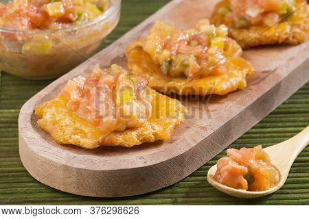 Patacón Fried Flattened Pieces Of Green Plantain (tostón, Tachino)