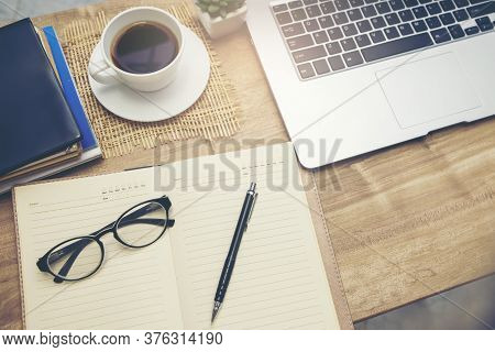 Desk For Student Concept. Laptop Computer For Study For Exam, Book Place On School Table For Student