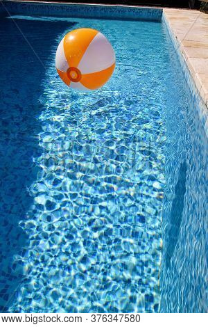 Rubber Air Yellow White Inflatable Ball And Toy For Swimming Pool In Transparent Blue Water. Multi-c