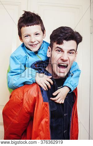 Faher And Son Together Having Fun At Home, Lifestyle Happy Family, People At Home