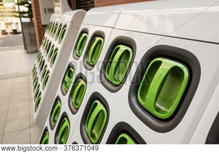 Taipei, Taiwan - August 17th, 2019: charging station for battery packs of Taiwan-based Gogoro electronic motocycle at street in Taipei, Taiwan, Asia