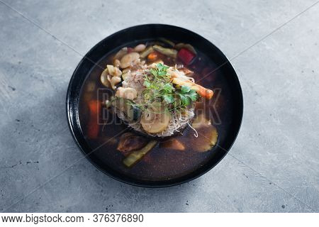 Healthy Plant-based Food Recipes Concept, Vegan Noodles Soup With Mixed Stir Fry Vegetables