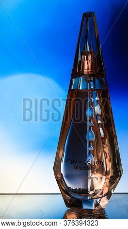 Zhytomyr, Ukraine - June 2, 2020. A Clear Orange Glass Spray Bottle Of Givenchy Ange Ou Demon Le Sec