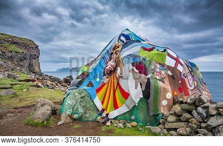 Eldgos And Frumskogur Boulder Covered With Clothes