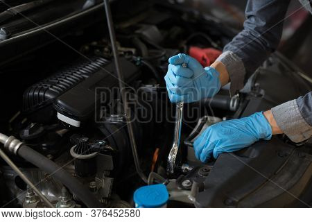 Checking The Engine, Mechanic Fixing The Engine, Copy-space.