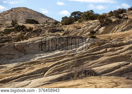 Sunny Day Among Rock Field And Water Cut Ledges At Moonrocks Nevada