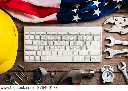 Happy Usa Labor Day Concept, Different Kinds Wrenches With The American Flag And Computer Keyboard. 