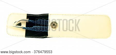 Two Metal Tool For Artificial Eyelashes On A White Background