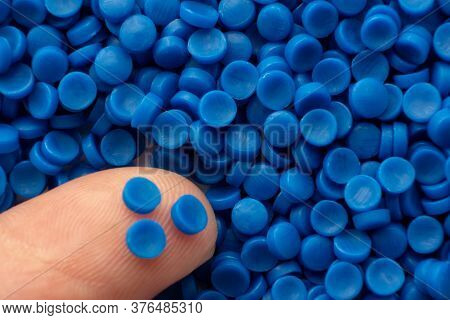 Close Up Of Blue Plastic. Plastic Polymer Granules, Raw Materials For Making Water Pipes, Plastics F