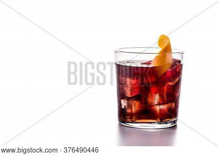 Boulevardier Cocktail And Orange Zest In Glass Isolated On White Background. Copy Space