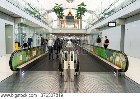 A Moving Walkway In Modern Large International Airport. Travelator Machine For Moving Passengers In 