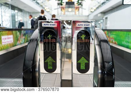 A Moving Walkway In Modern Large International Airport. Travelator Machine For Moving Passengers In 