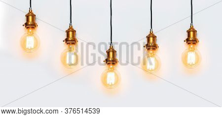 Creative Idea Concept, Designer Lamp, Modern Interior Item. Vintage Fashionable Edison Lamp On Light