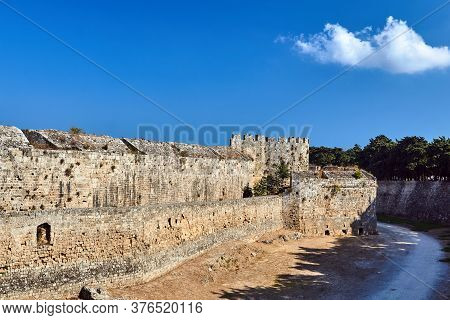 The Moat And Turrets Of The Medieval Castle Of The Joannite Order In The City Of Rhodes