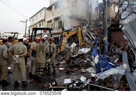 Salvador, Bahia / Brazil - May 16, 2013: Member Of The Fire Department And Volunteers Are Seen In Th