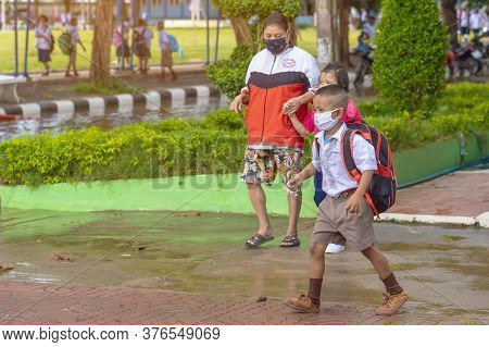 Kanchanaburi,thailand-july 2,2020:thai Students Wear Various Medical Masks To Prevent Themselves Fro