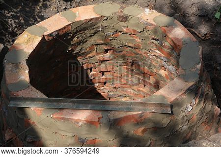Building A Round Septic Tank, Sewer, Sewage, Cesspool Or Soak Pit For Domestic Wastewater From Red B