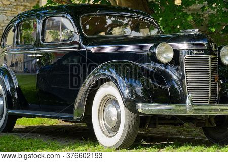 Haapsalu, Estonia - 12.07.2020 : Retro Cars In Haapsalu. Closeup Of Black Retro Car Chrysler Royal.