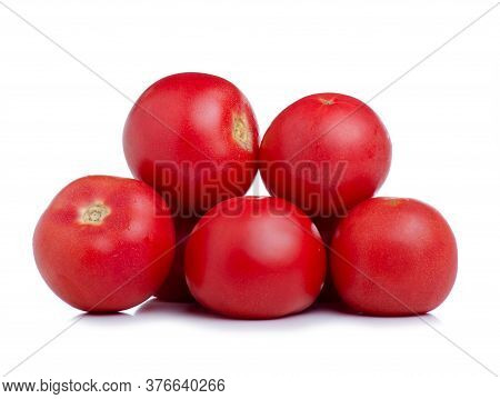 Fresh Pink Tomatoes On White Background Isolation