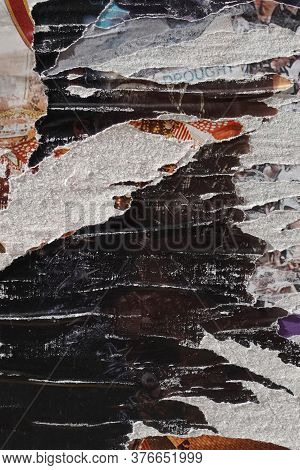Layers Of Torn Posters Abstract Grunge Background With Copy-space.