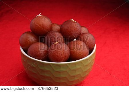 Indian Dessert Gulabjamun Fried Balls Socked In Sugar Syrup