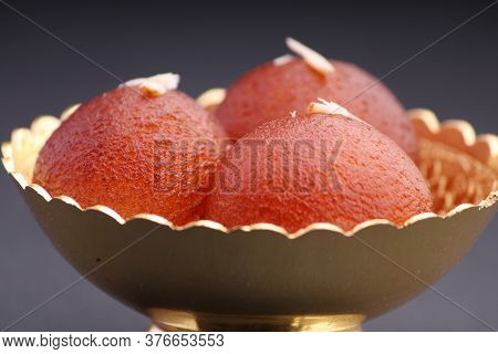 Indian Dessert Gulabjamun Fried Balls Socked In Sugar Syrup