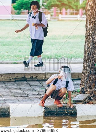Kanchanaburi,thailand-july 2,2020:unidentified Elementary School Students Wear Face Mask To Prevent 