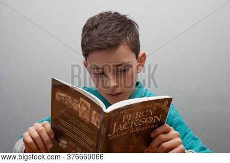 A Nine Year Old Boy Reading Percy Jackson And The Sea Of Monsters, Taken On The 27th February 2020 I
