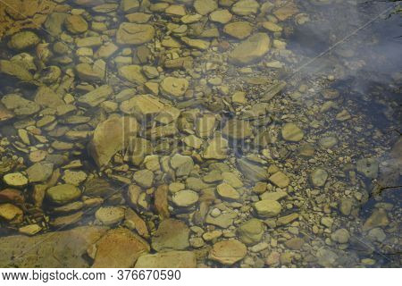 River Bottom With Stones

River With Stones Background In Texture - Little Water In Summer