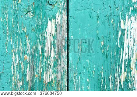 Old Rustic Painted Cracky Green, Turquoise Wooden Texture Or Background.