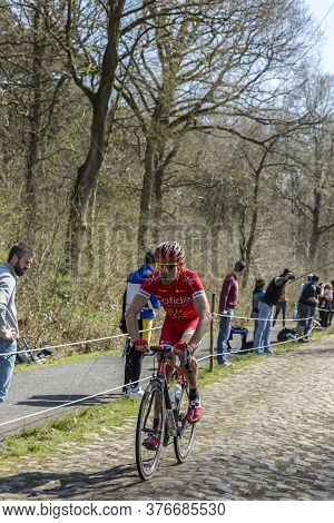 Wallers,france - April 12,2015: The French Cyclist, Cyril Lemoine Of Cofidis Team Riding On A Cobble