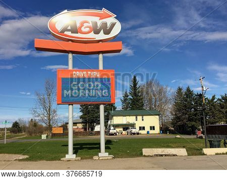 Yellowhead Highway, Alberta, Canada - May 16th, 2020: A Huge A&w Drive Through Sign Wishing Customer