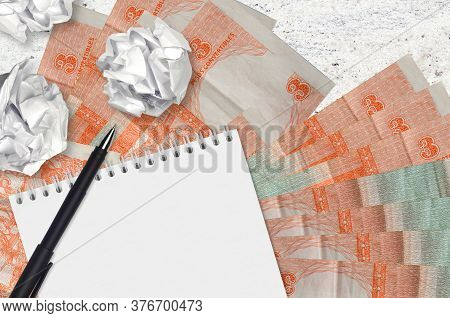 3 Cuban Pesos Convertibles Bills And Balls Of Crumpled Paper With Blank Notepad. Bad Ideas Or Less O