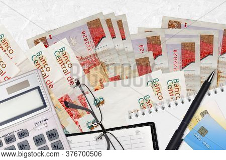 3 Cuban Pesos Convertibles Bills And Calculator With Glasses And Pen. Tax Payment Concept Or Investm