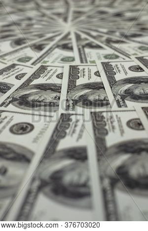 Group Of Money Stack Of 100 Us Dollars Banknotes A Lot Of Is Arranged In A Beautiful, Selective Focu