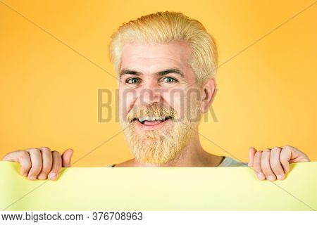 Smiling Man Holding Card, Man With Banner, Isolated Yellow Background, Man Showing Empty Card