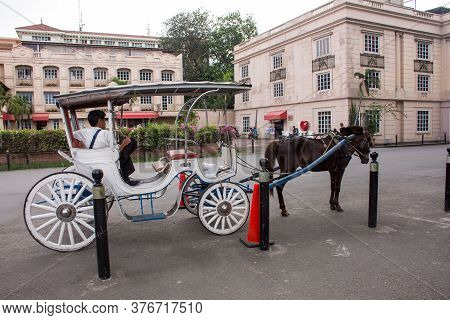 Manila, Philippines - December 27, 2016: Kalesa (horse Drawn Carriage) In Intramuros
