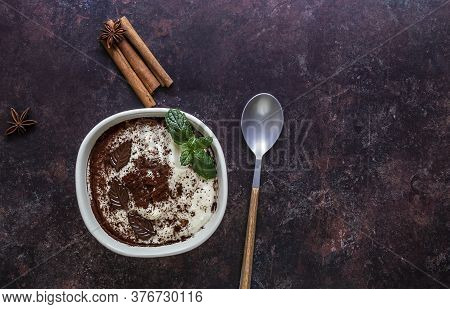 Traditional Azerbaijani Phirni - Sweet Rice Pudding With Cinnamon And Chocolate. Copy Space For Reci