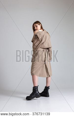 Attractive Caucasian Skinny Girl With Long Hair Posing On White Cyclorama. Beauty Portrait, Model Te