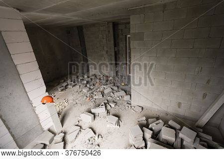 Wall Smashed Into Debris Room In Apartment Ready For Renovation With Destroyed Smashed Wall Demolish