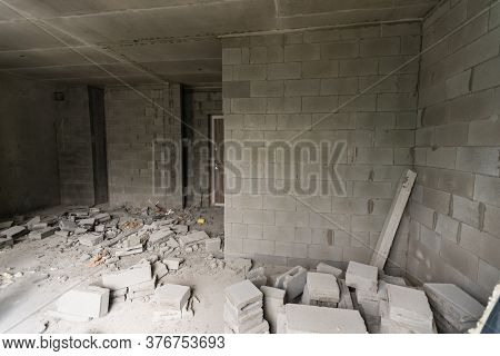 Wall Smashed Into Debris Room In Apartment Ready For Renovation With Destroyed Smashed Wall Demolish