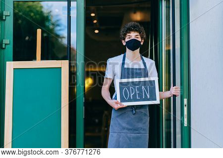 Business Owner Attractive Young Asian Man In Apron Hanging Were Open Sign On Front Door Welcoming Cl