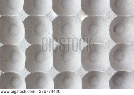 Background Container With Cells Of Pressed Paper For Laying Eggs. Paper Packaging For Eggs With Cell