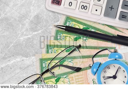 10 Sri Lankan Rupees Bills And Calculator With Glasses And Pen. Business Loan Or Tax Payment Season 