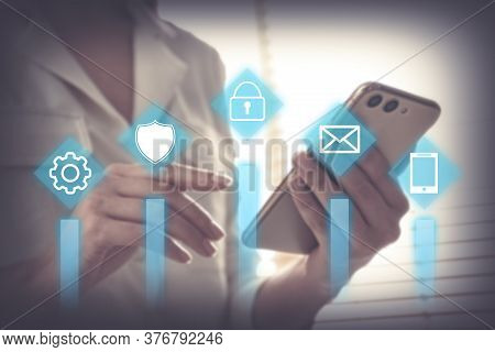 Information Security. Young Woman Using Smartphone Indoors, Closeup